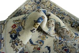 Close-up detail of New Kashan rug from Iran / Persia showing Wool weave