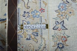 Surface texture of New Kashan rug with natural Wool and intricate pattern