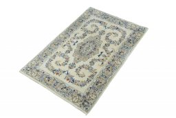 Corner detail of New Kashan rug showing border pattern and Wool pile
