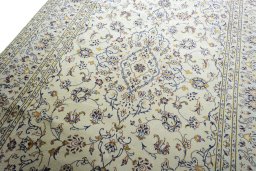 Backside of handmade New Kashan rug showing knot structure and weave density