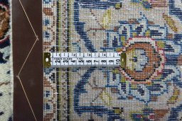 Surface texture of 2000s Kashan rug with natural Wool and intricate pattern