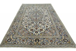 Surface texture of 2000s Kashan rug with natural Wool and intricate pattern