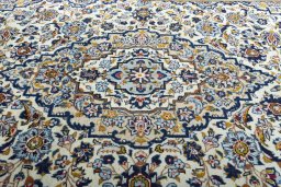 Central medallion detail of 2000s Kashan rug from Iran / Persia