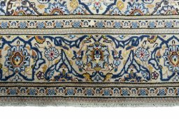 Close-up detail of 2000s Kashan rug from Iran / Persia showing Wool weave