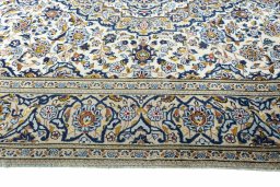 Full view of 2000s Kashan rug from Iran / Persia, 315 × 192 cm in Beige tones