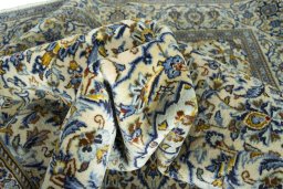 Surface texture of New Kashan rug with natural Wool and intricate pattern
