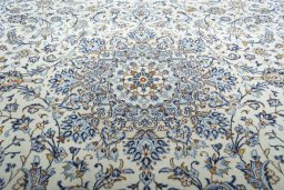 Central medallion detail of 2000s Kashan rug from Iran / Persia