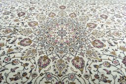 Central medallion detail of 2000s Kashan rug from Iran / Persia