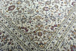 Close-up detail of 2000s Kashan rug from Iran / Persia showing Wool weave