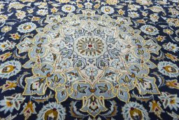 Central medallion detail of 2000s Kashan rug from Iran / Persia