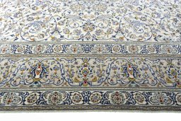 Close-up detail of 2000s Kashan rug from Iran / Persia showing Wool weave