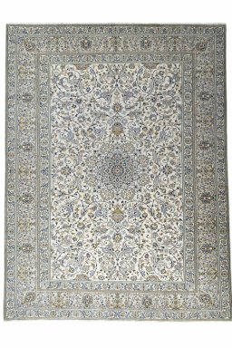 Corner detail of 2000s Kashan rug showing border pattern and Wool pile