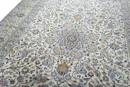 Central medallion detail of 2000s Kashan rug from Iran / Persia