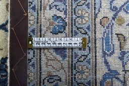 Surface texture of 2000s Kashan rug with natural Wool and intricate pattern