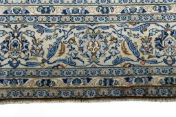 Close-up detail of 2000s Kashan rug from Iran / Persia showing Wool weave
