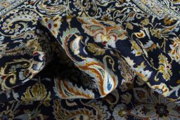 Surface texture of 2000s Kashan rug with natural Wool and intricate pattern