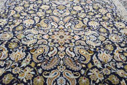 Central medallion detail of 2000s Kashan rug from Iran / Persia
