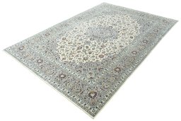 Corner detail of New Kashan rug showing border pattern and Wool pile