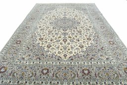 Surface texture of New Kashan rug with natural Wool and intricate pattern