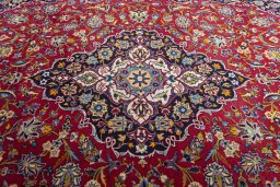 Central medallion detail of 2000s Kashan rug from Iran / Persia
