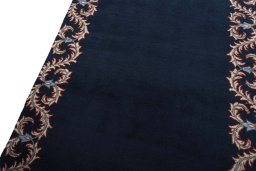 Surface texture of 2000s Kashan rug with natural Wool and intricate pattern