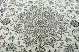 Central medallion detail of 2000s Kashan rug from Iran / Persia