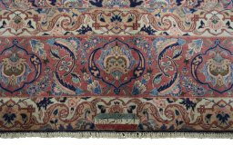 Surface texture of 1930s Kashan rug with natural Wool and intricate pattern