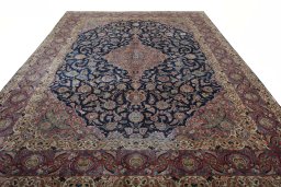 Surface texture of 1930s Kashan rug with natural Wool and intricate pattern