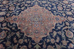 Central medallion detail of 1930s Kashan rug from Iran / Persia