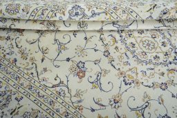 Close-up detail of 2000s Kashan rug from Iran / Persia showing Wool weave