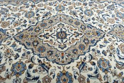 Central medallion detail of 2000s Kashan rug from Iran / Persia