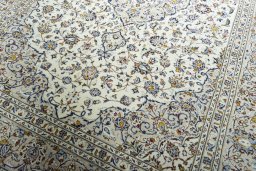 Close-up detail of 2000s Kashan rug from Iran / Persia showing Wool weave