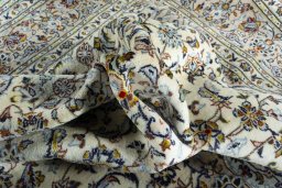 Surface texture of 2000s Kashan rug with natural Wool and intricate pattern
