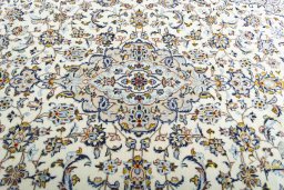 Central medallion detail of 2000s Kashan rug from Iran / Persia