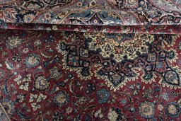 Close-up detail of 1930s Kashan rug from Iran / Persia showing Wool weave