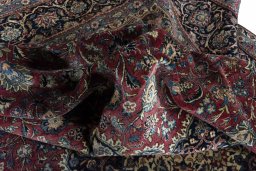 Surface texture of 1930s Kashan rug with natural Wool and intricate pattern