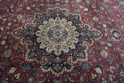 Central medallion detail of 1930s Kashan rug from Iran / Persia