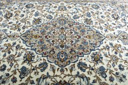 Central medallion detail of 2000s Kashan rug from Iran / Persia