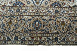 Full view of 2000s Kashan rug from Iran / Persia, 352 × 245 cm in Beige tones