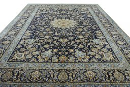 Surface texture of 2000s Kashan rug with natural Wool and intricate pattern