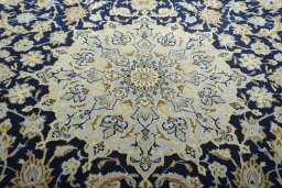 Central medallion detail of 2000s Kashan rug from Iran / Persia