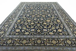 Surface texture of 2000s Kashan rug with natural Wool and intricate pattern
