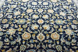 Central medallion detail of 2000s Kashan rug from Iran / Persia