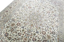 Backside of handmade 2000s Kashan rug showing knot structure and weave density