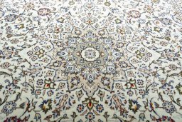 Central medallion detail of 2000s Kashan rug from Iran / Persia