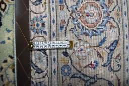 Close-up detail of 2000s Kashan rug from Iran / Persia showing Wool weave