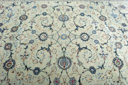Central medallion detail of 2000s Kashan rug from Iran / Persia