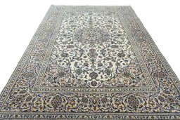 Surface texture of 2000s Kashan rug with natural Wool and intricate pattern