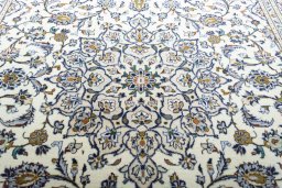 Central medallion detail of 2000s Kashan rug from Iran / Persia