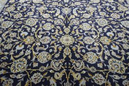 Central medallion detail of 2000s Kashan rug from Iran / Persia